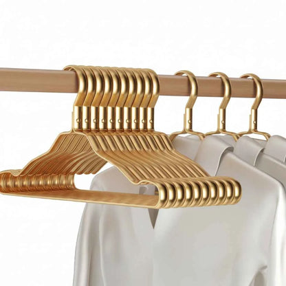 Cintre pour étendoir à linge aluminium doré