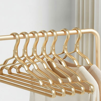 Cintre pour étendoir à linge aluminium doré