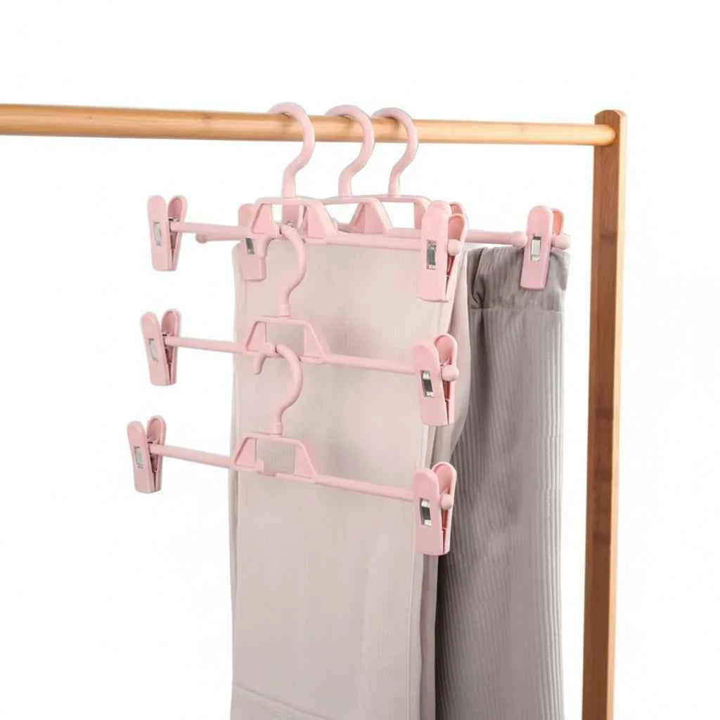 Cintre pour étendoir à linge avec pinces réglables