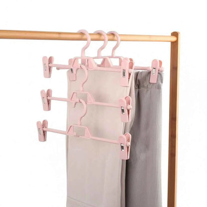 Cintre pour étendoir à linge avec pinces réglables