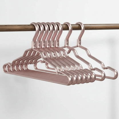 Cintre pour étendoir à linge aluminium doré