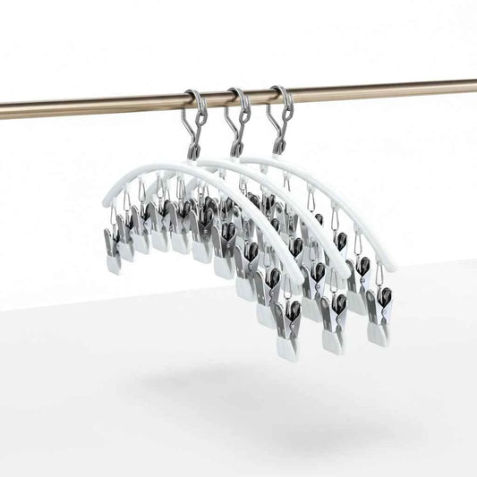 Cintre pour étendoir à linge avec pinces antidérapantes