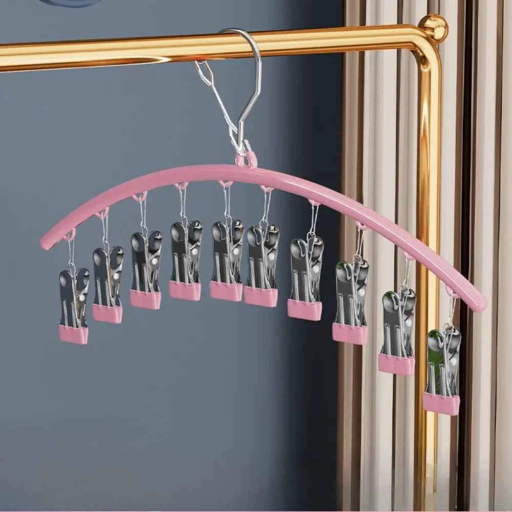 Cintre pour étendoir à linge avec pinces antidérapantes