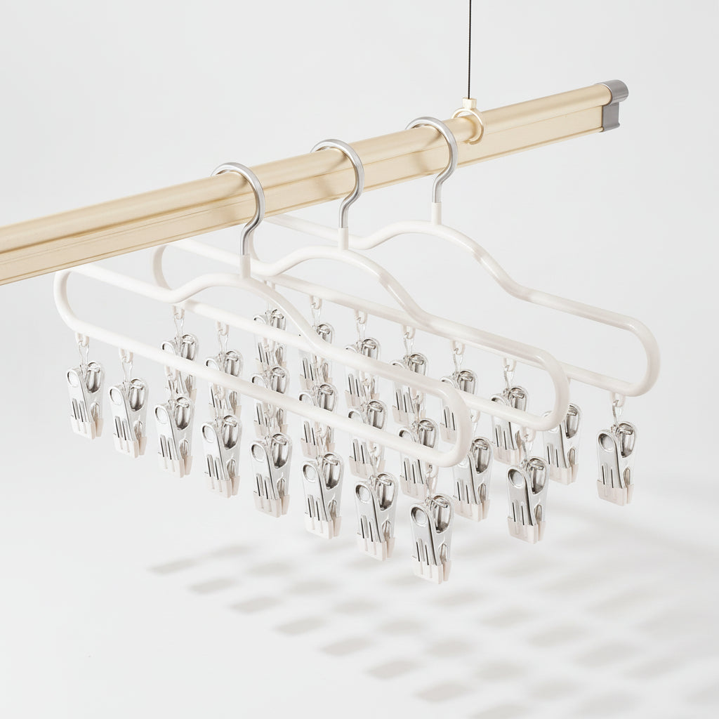 Cintre pour étendoir à linge avec pinces multiples