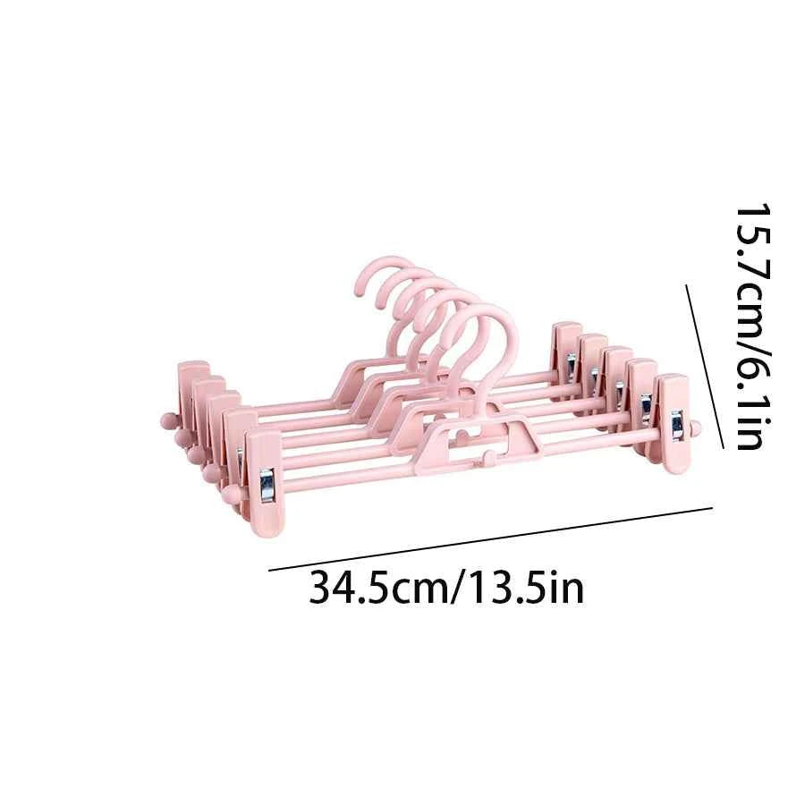 Cintre pour étendoir à linge avec pinces pantalons