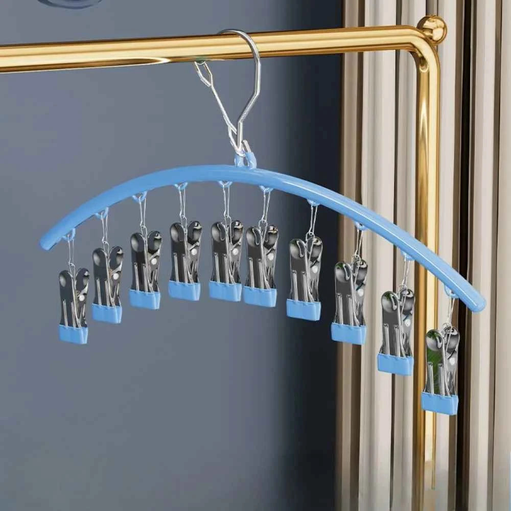 Cintre pour étendoir à linge avec pinces antidérapantes