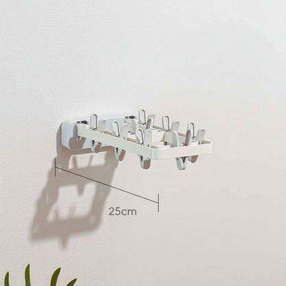 Étendoir à linge mural rabattable avec pinces socks