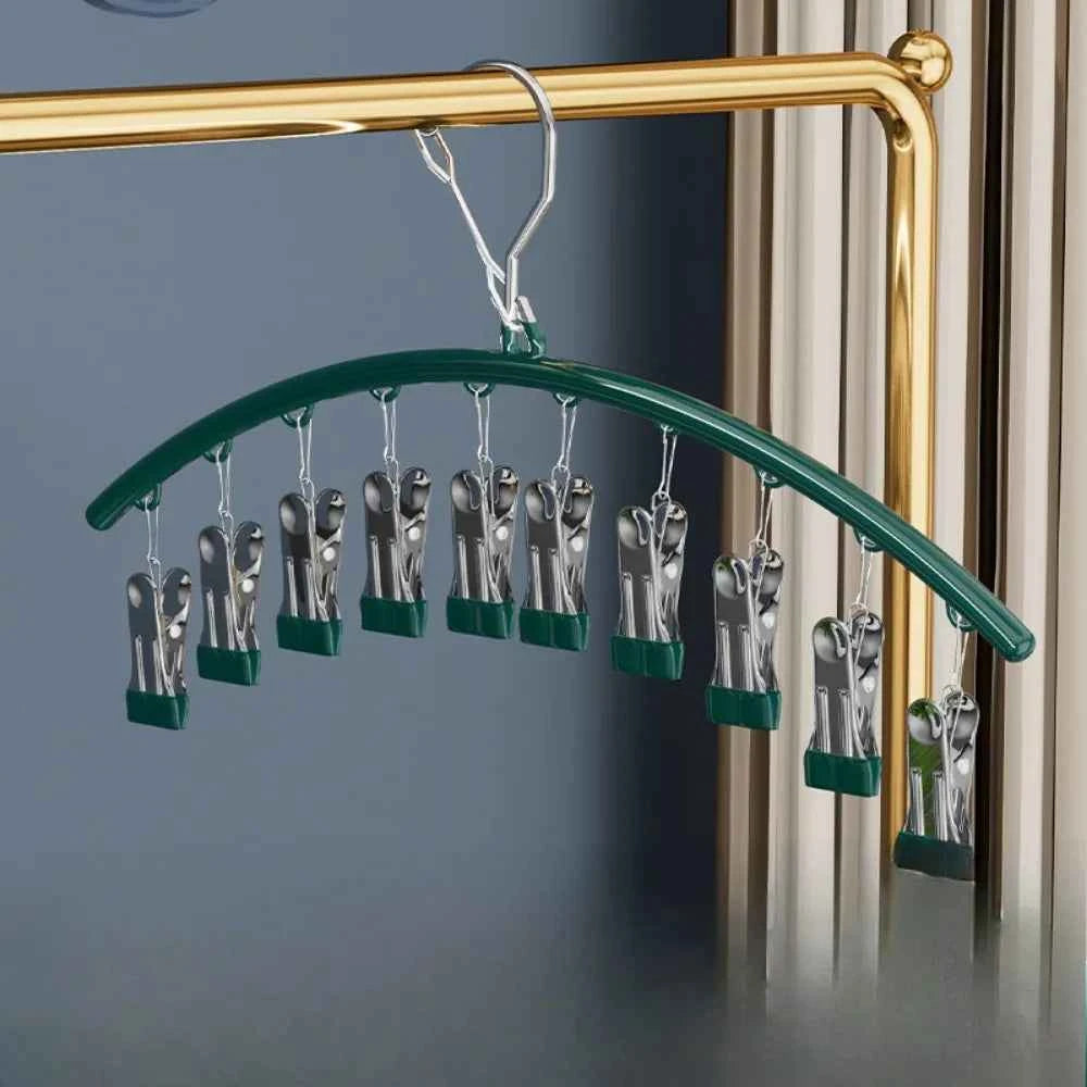 Cintre pour étendoir à linge avec pinces antidérapantes