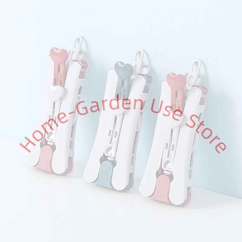 Cintre pour étendoir à linge pliable de voyage