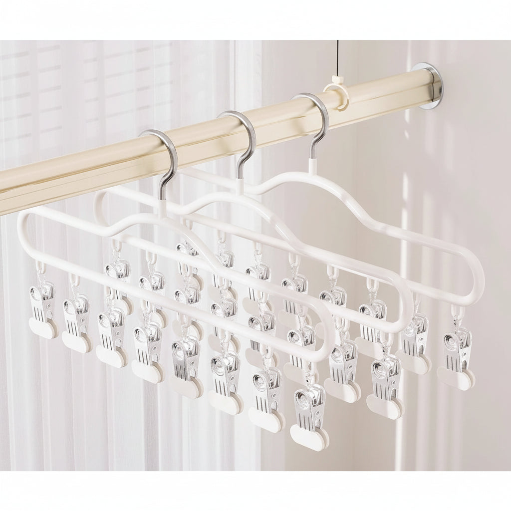 Cintre pour étendoir à linge avec pinces multiples