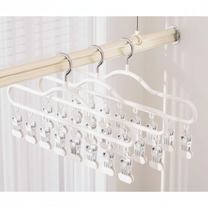 Cintre pour étendoir à linge avec pinces multiples