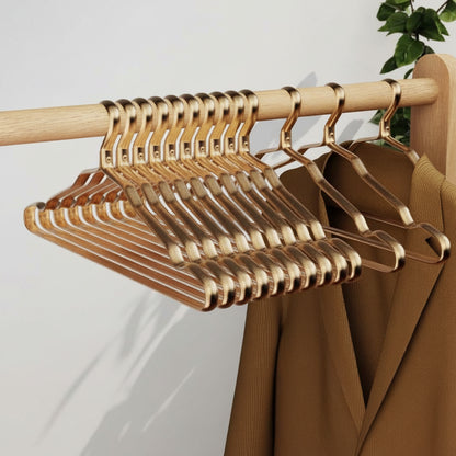 Cintre pour étendoir à linge aluminium doré