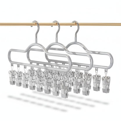 Cintre pour étendoir à linge avec pinces multiples