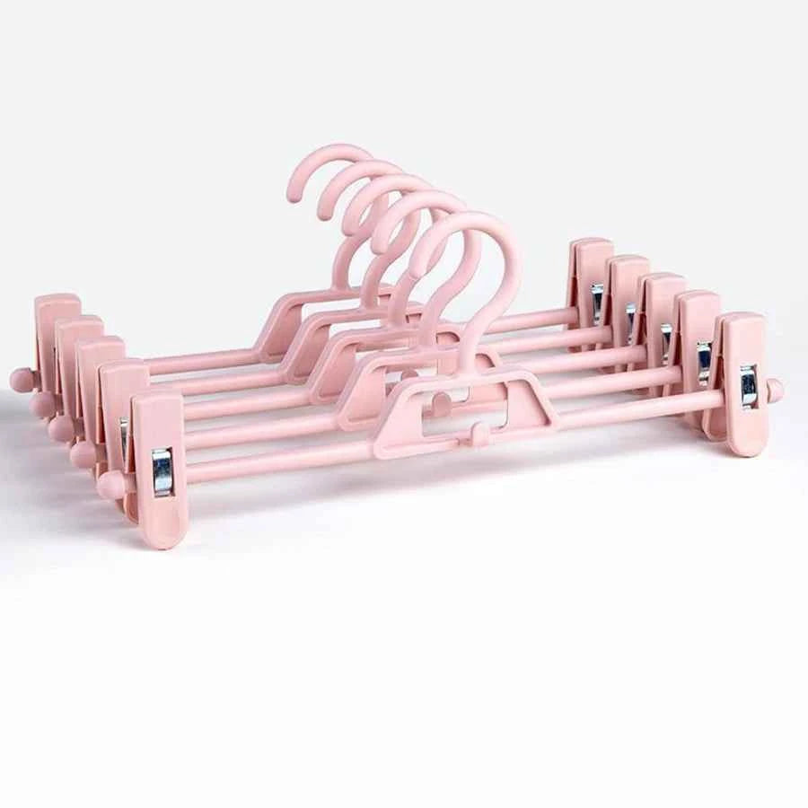 Cintre pour étendoir à linge avec pinces pantalons