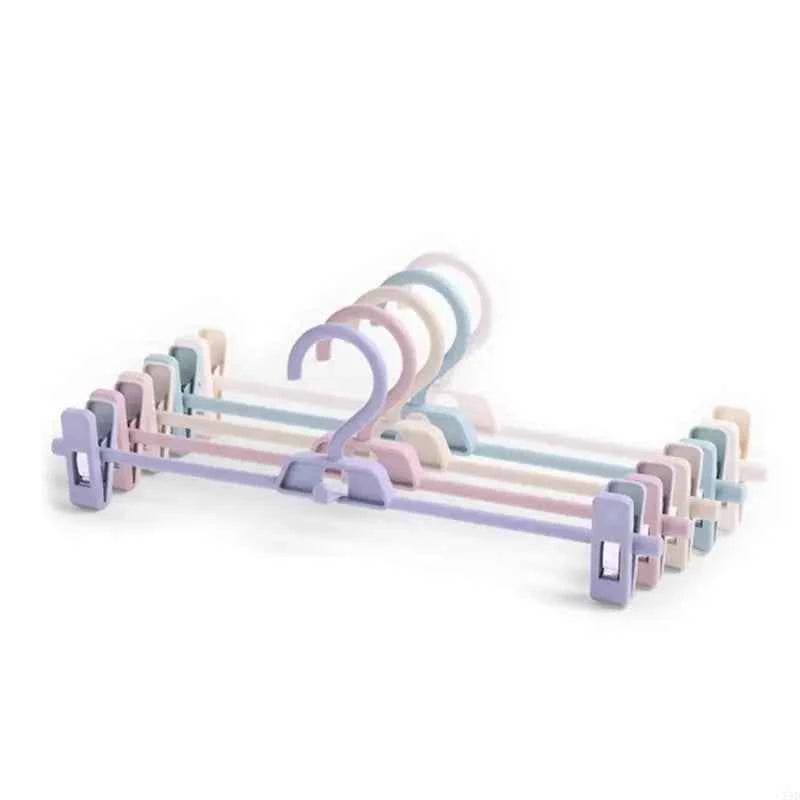 Cintre pour étendoir à linge avec pinces réglables