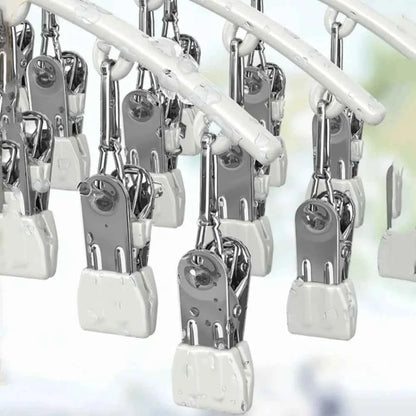 Cintre pour étendoir à linge avec pinces antidérapantes