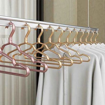 Cintre pour étendoir à linge aluminium doré