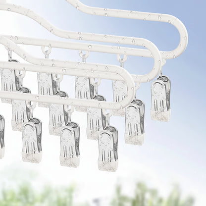 Cintre pour étendoir à linge avec pinces multiples