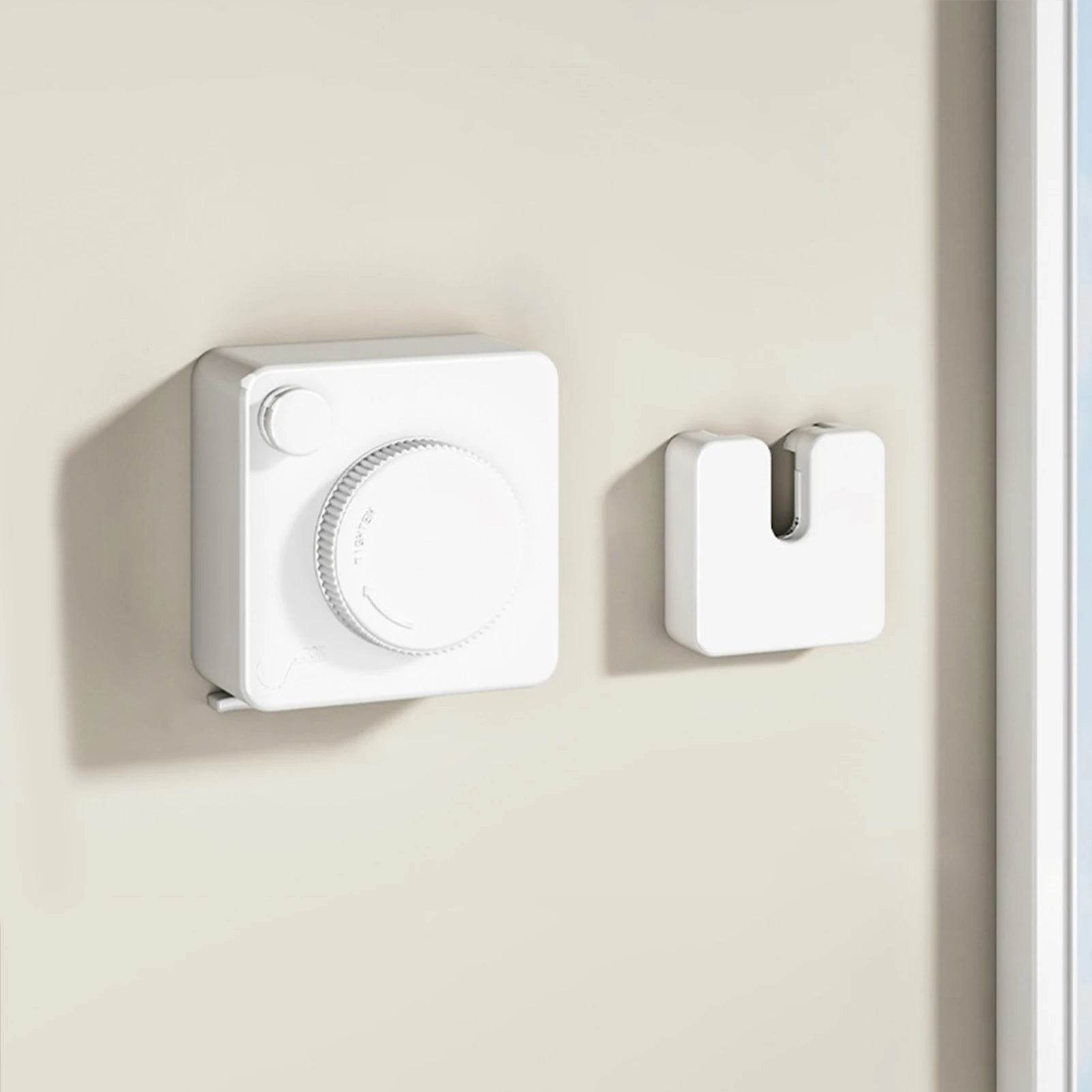 Étendoir à linge mural rétractable carré discret - L'Univers de l'Étendoir